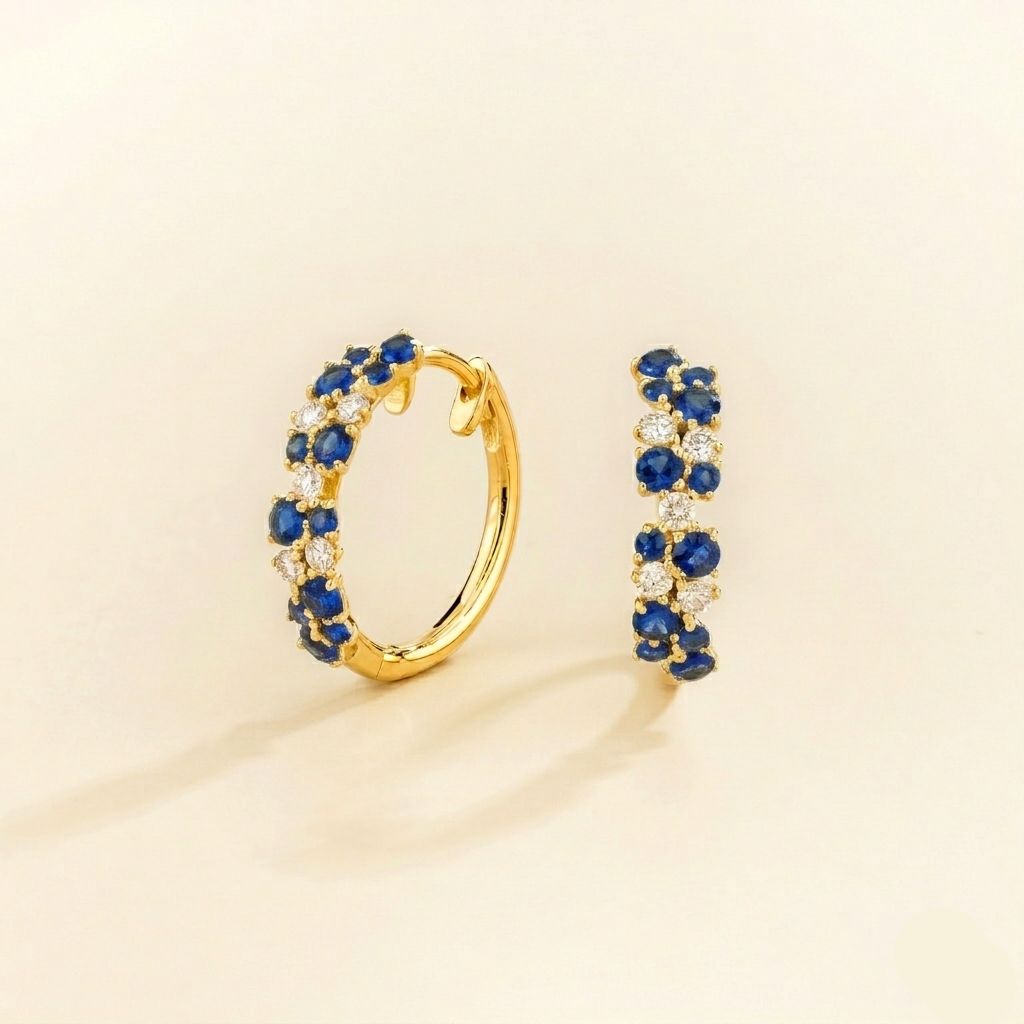 Lab-grown blue sapphire and diamond cluster huggie hoop earrings, Starry design in gold | Juvetti London