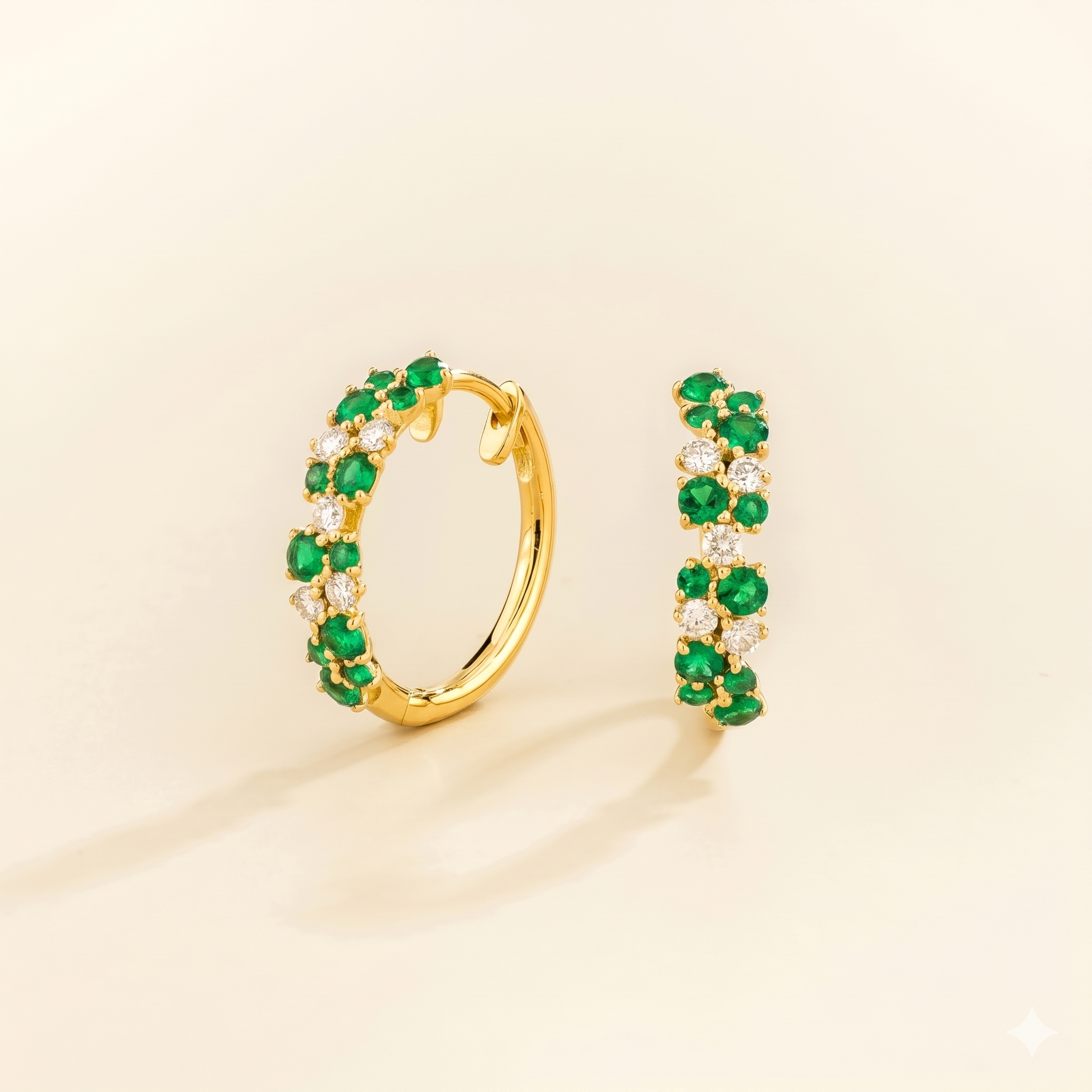 Starry Emerald & Diamond Cluster Huggie Hoop Earrings in Gold