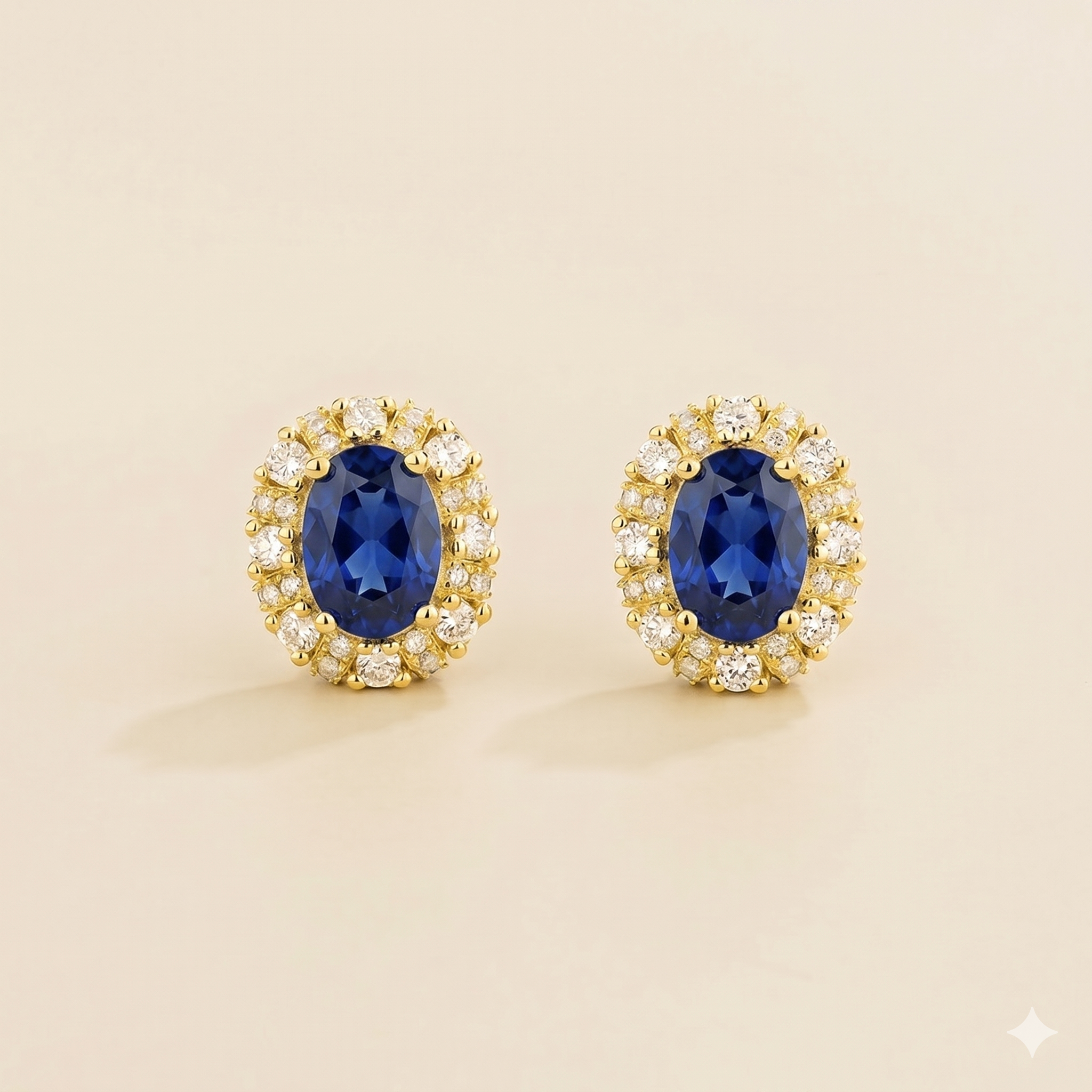 Viva Oval Blue Sapphire Halo Stud Earrings with Diamond Accents in Gold