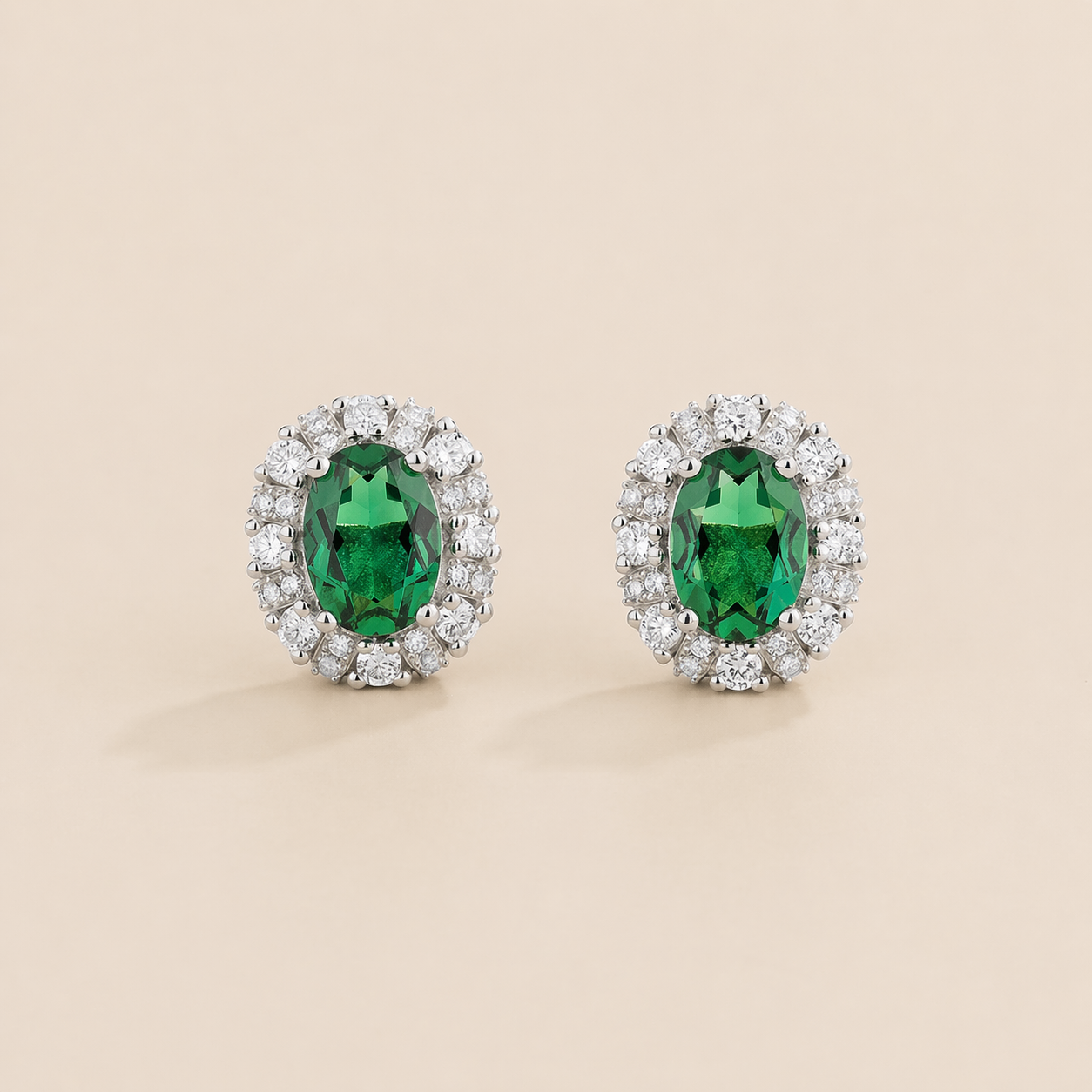 Viva Oval Emerald Halo Stud Earrings with Diamond Accents in White Gold