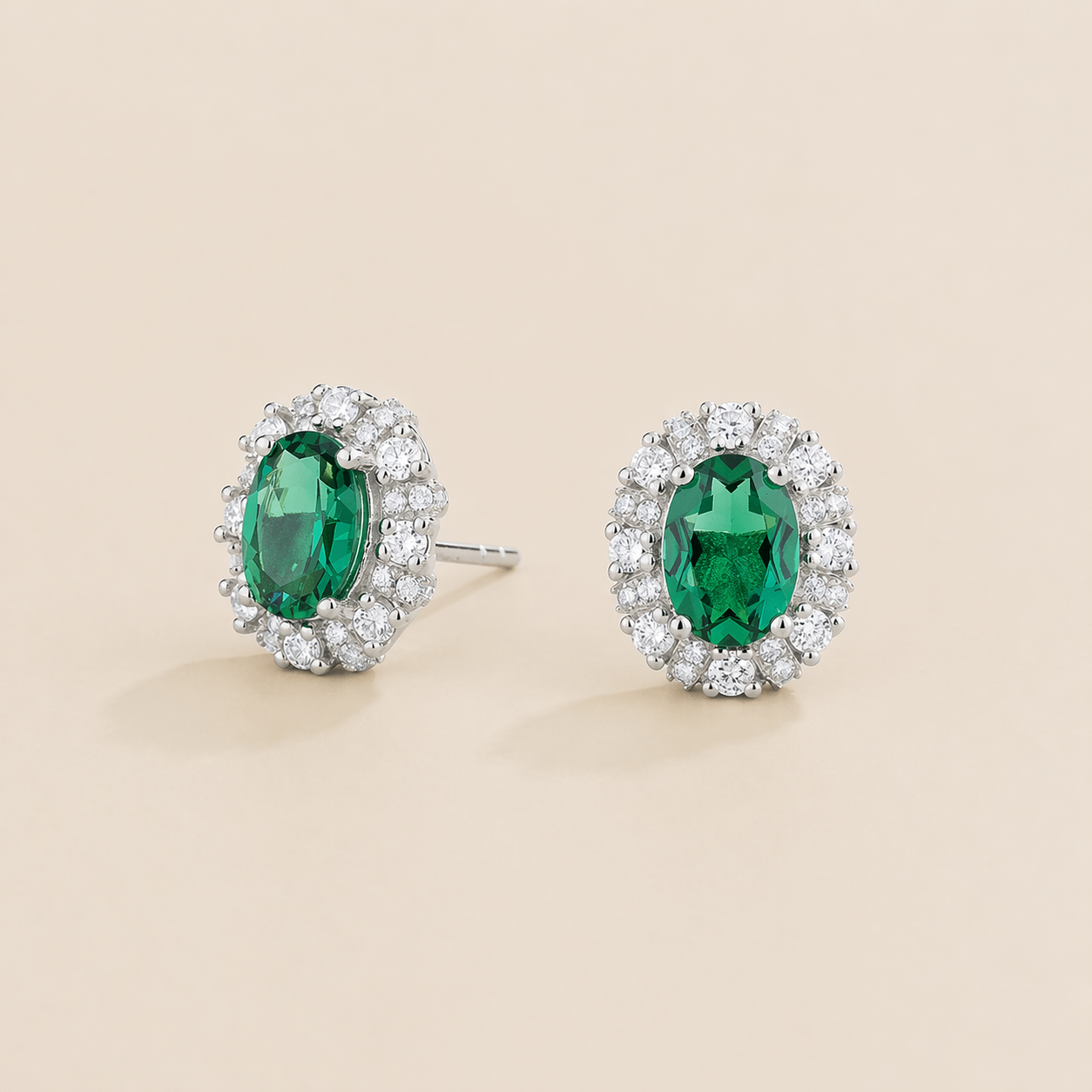 Viva Oval Emerald Halo Stud Earrings with Diamond Accents in White Gold
