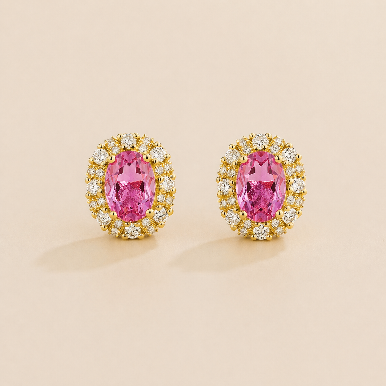 Viva Oval Pink Sapphire Halo Stud Earrings with Diamond Accents in Gold