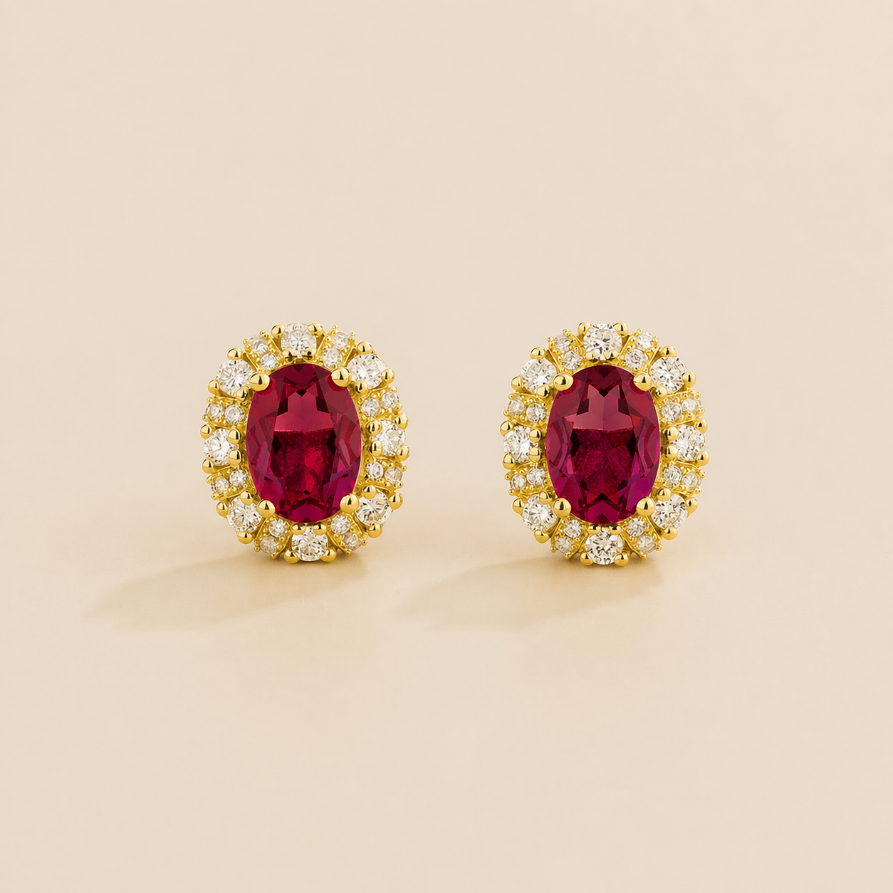 Viva Oval Ruby Halo Stud Earrings with Diamond Accents in Gold