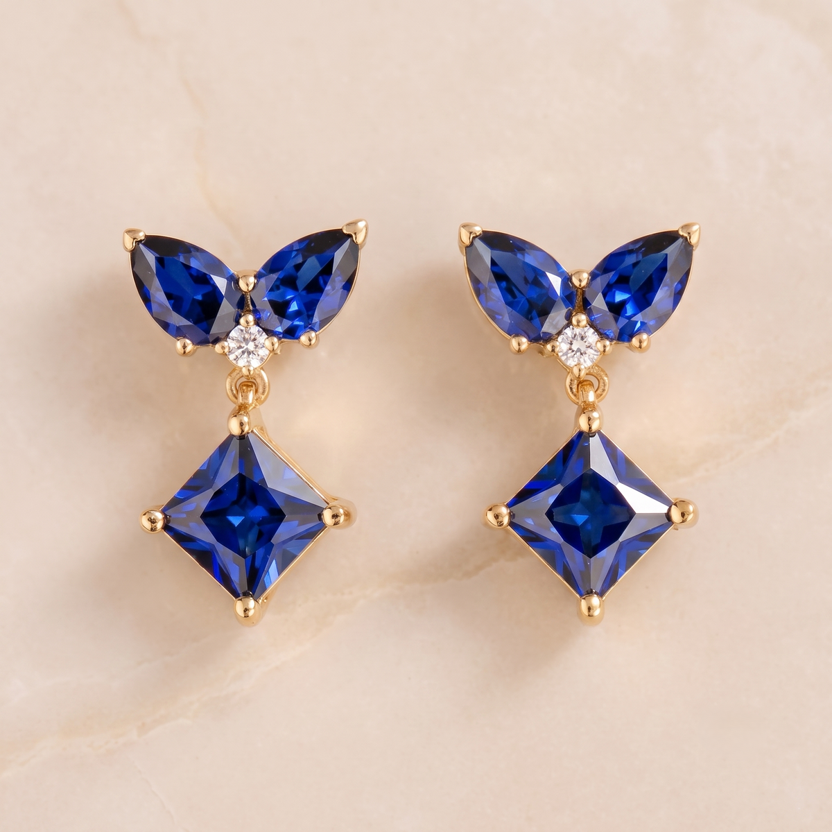 Amore Blue Sapphire & Diamond Butterfly Drop Earrings in Gold | Juvetti