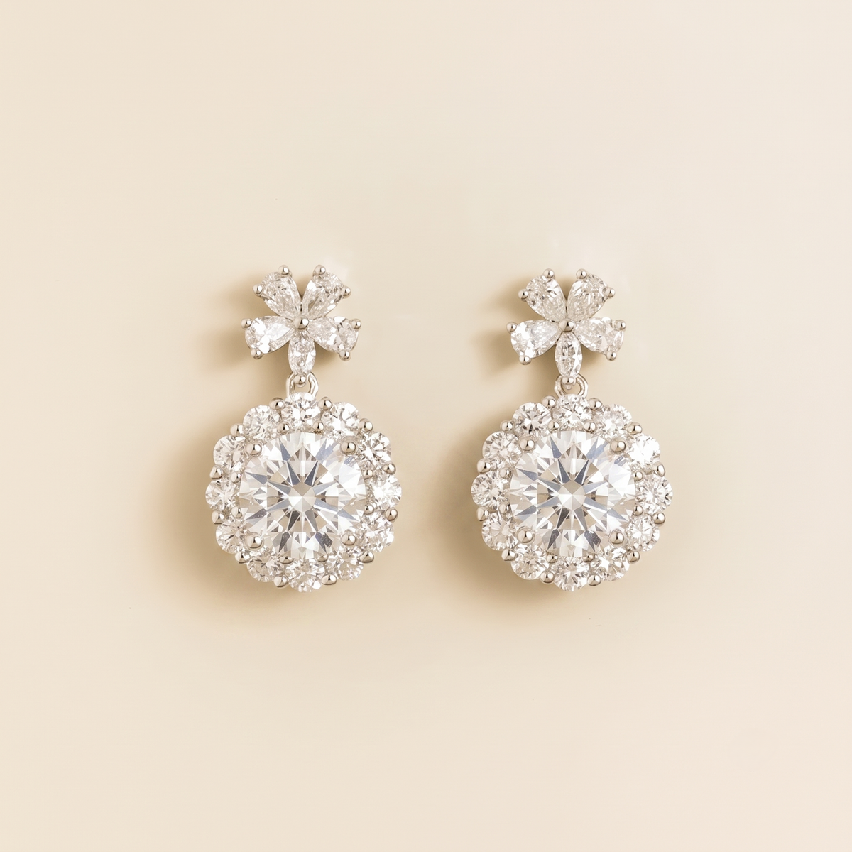 Antoinette round diamond halo pendant earrings with flower bail in white gold | Juvetti