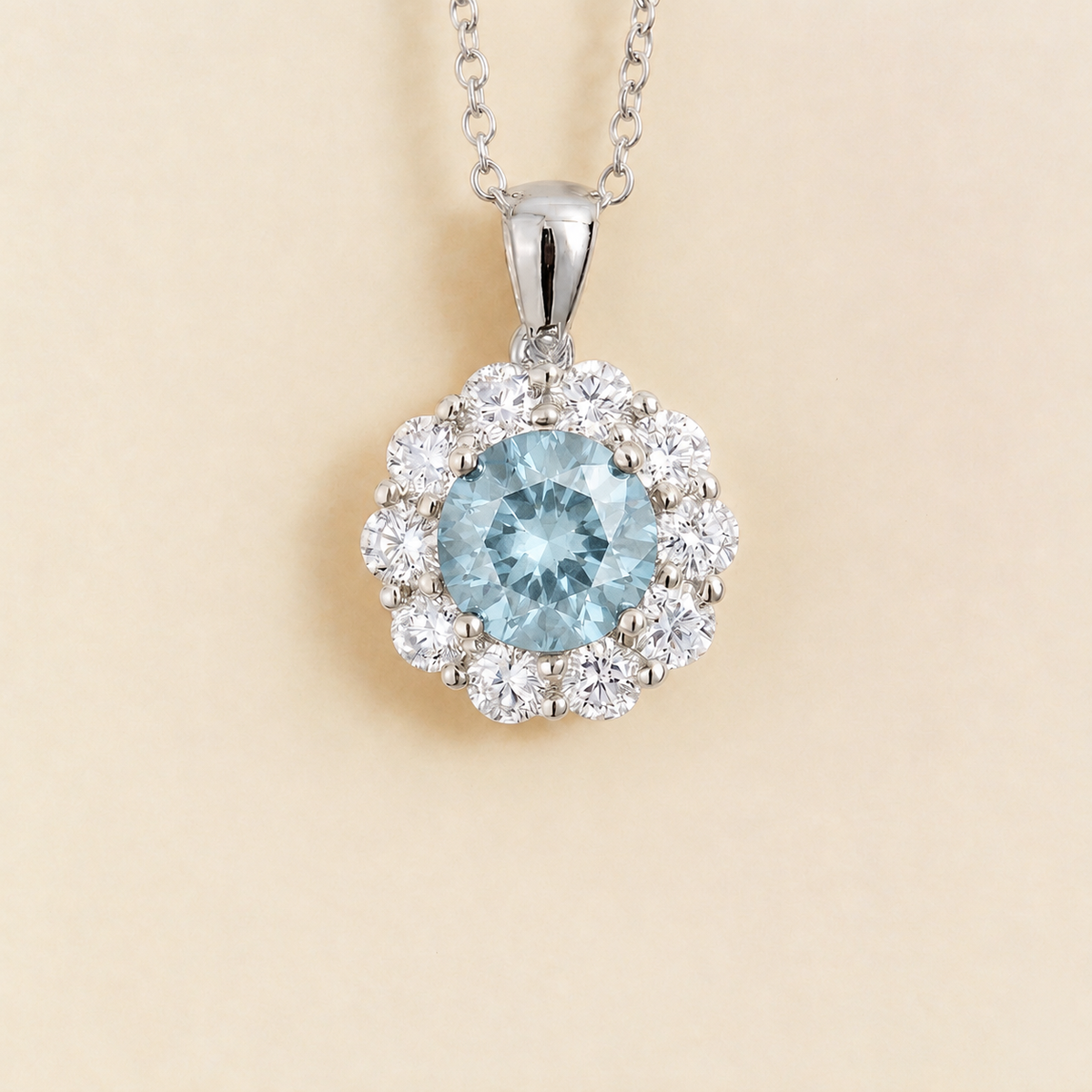 Floret aquamarine and diamond halo pendant necklace in white gold