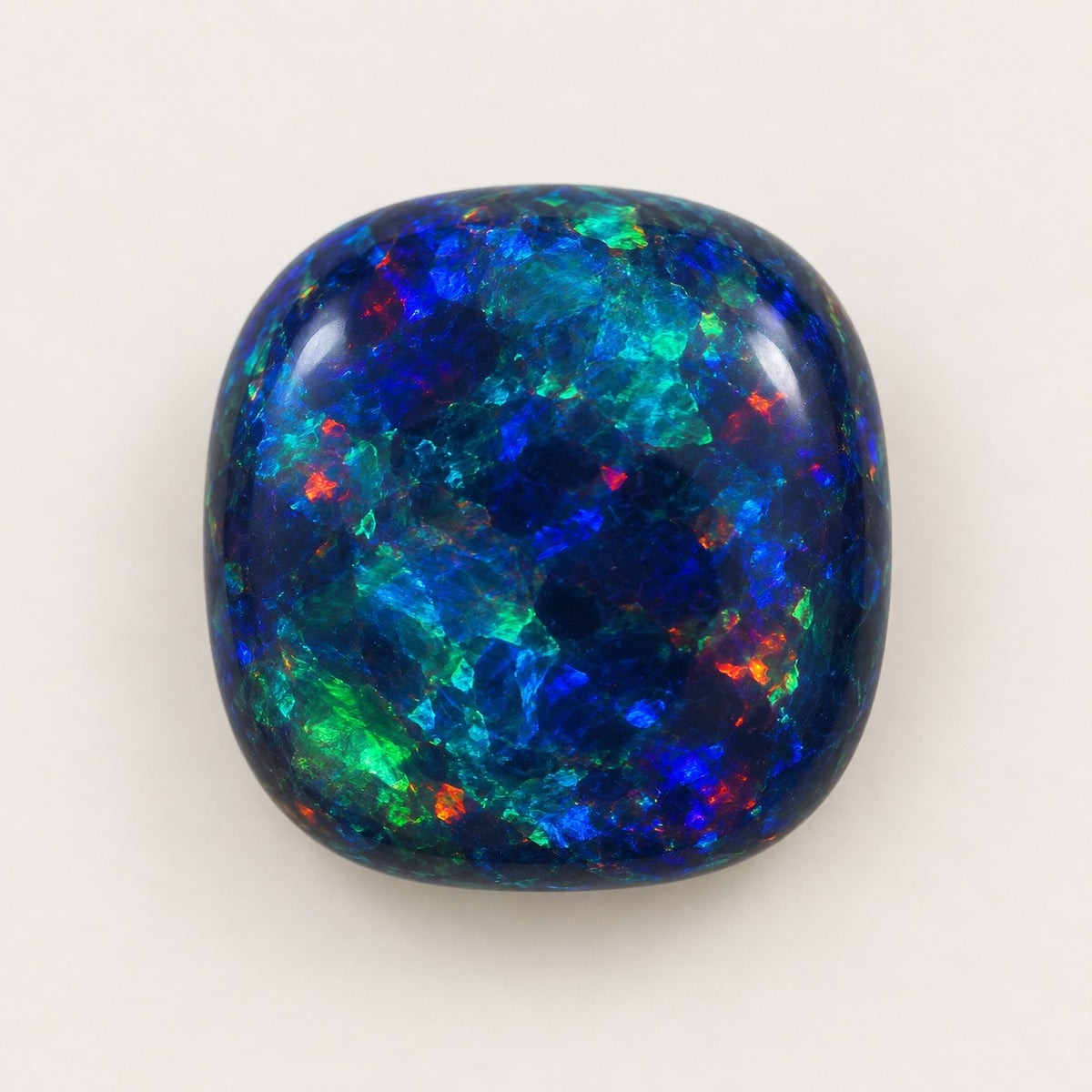 Black lab-grown opal, cushion cabochon