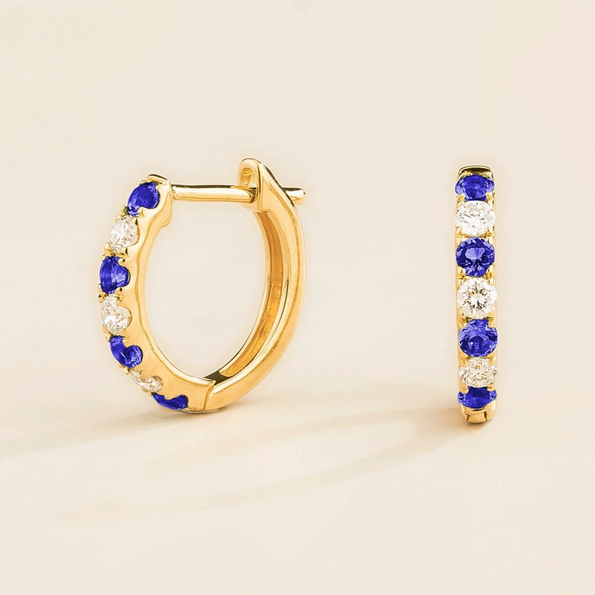 Stacy Blue Sapphire & Diamond Huggie Hoop Earrings in Gold | Juvetti