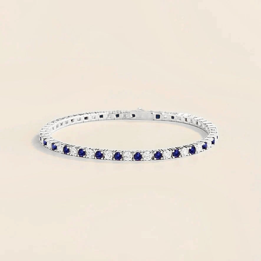 Stacy blue sapphire & diamond round tennis bracelet in white gold