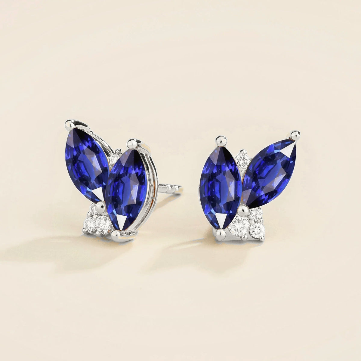Marquise Blue Sapphire & Diamond Cluster Stud Earrings in White Gold