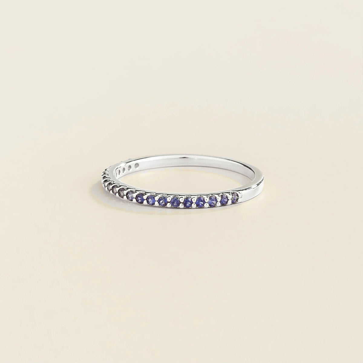 Blue Sapphire Half Eternity Band in White Gold