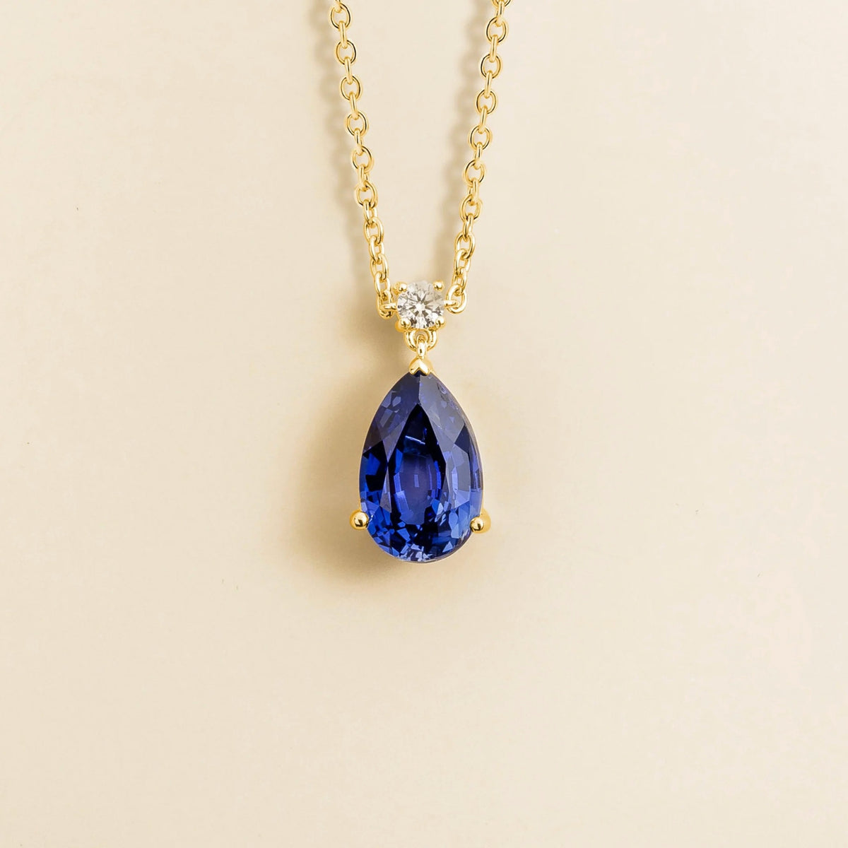 Lab-grown blue sapphire and diamond pear drop pendant necklace in gold, large – front view | Pisa by Juvetti