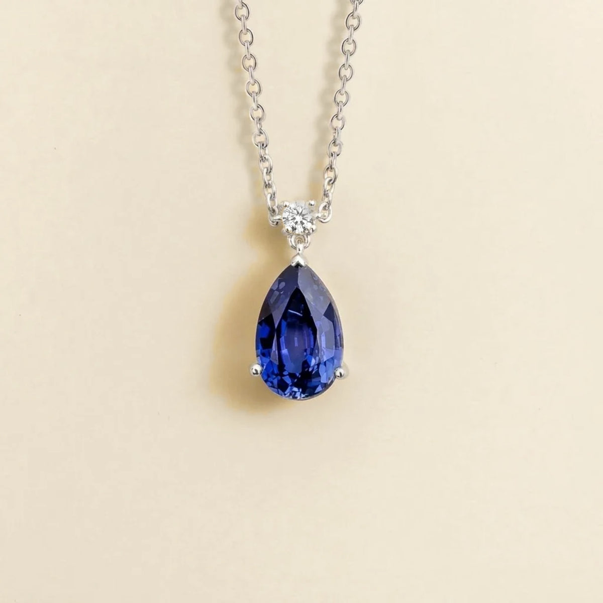 Lab-grown blue sapphire and diamond pear drop pendant necklace in white gold, large – front view | Pisa by Juvetti