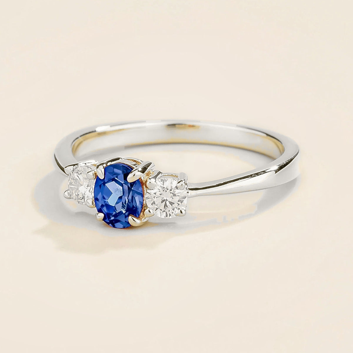Boble Blue Sapphire Oval & Diamond Three-Stone Ring in White Gold – angle view