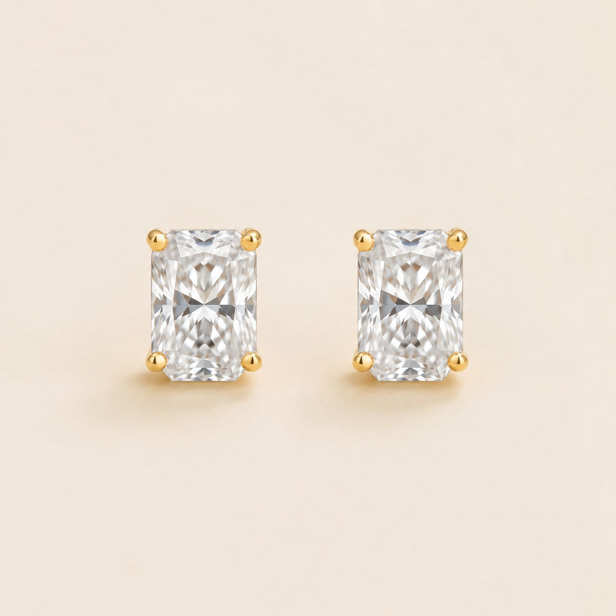 Clair radiant lab-grown diamond solitaire stud earrings in gold – front view | Juvetti