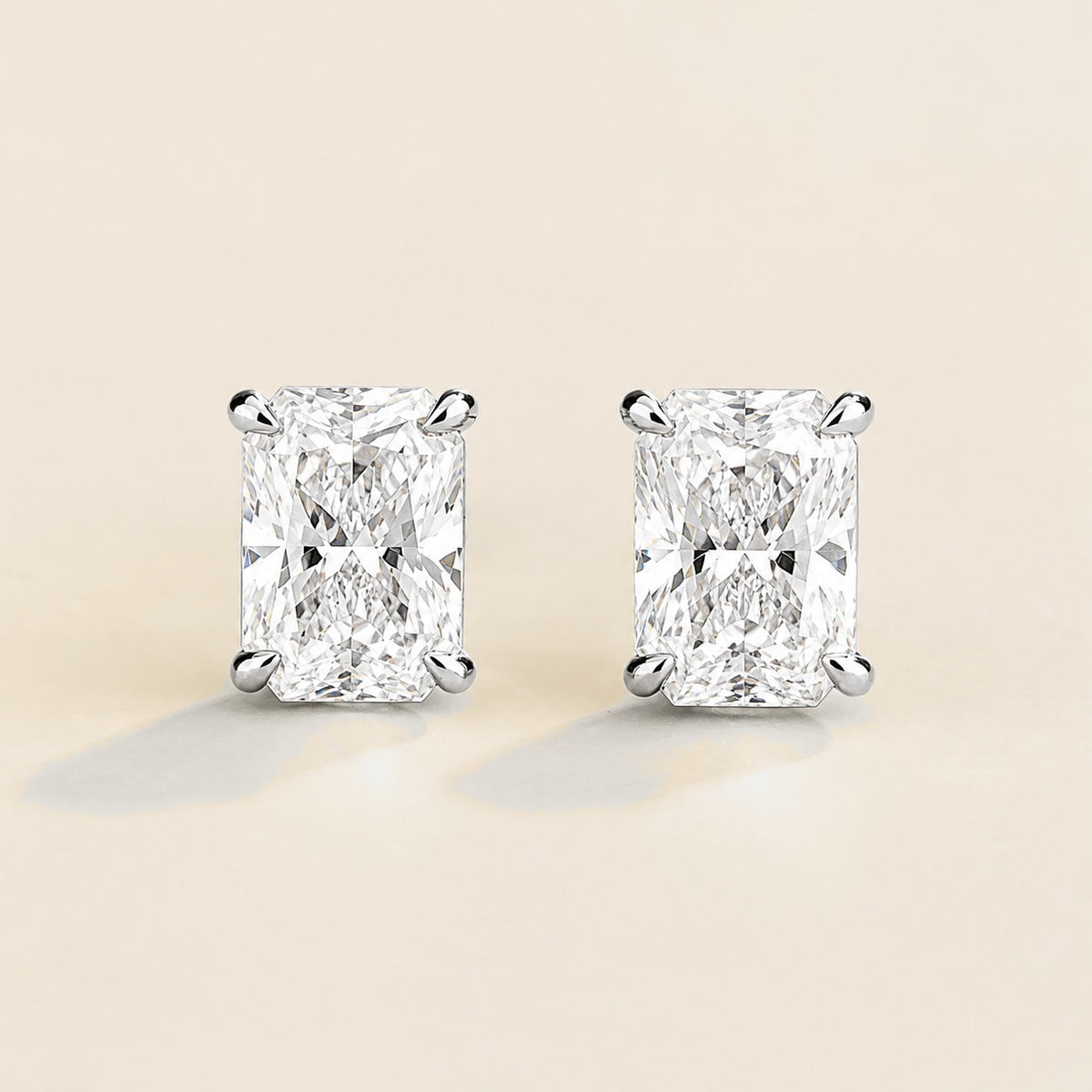 Clair radiant lab-grown diamond solitaire stud earrings in white gold – front view | Juvetti