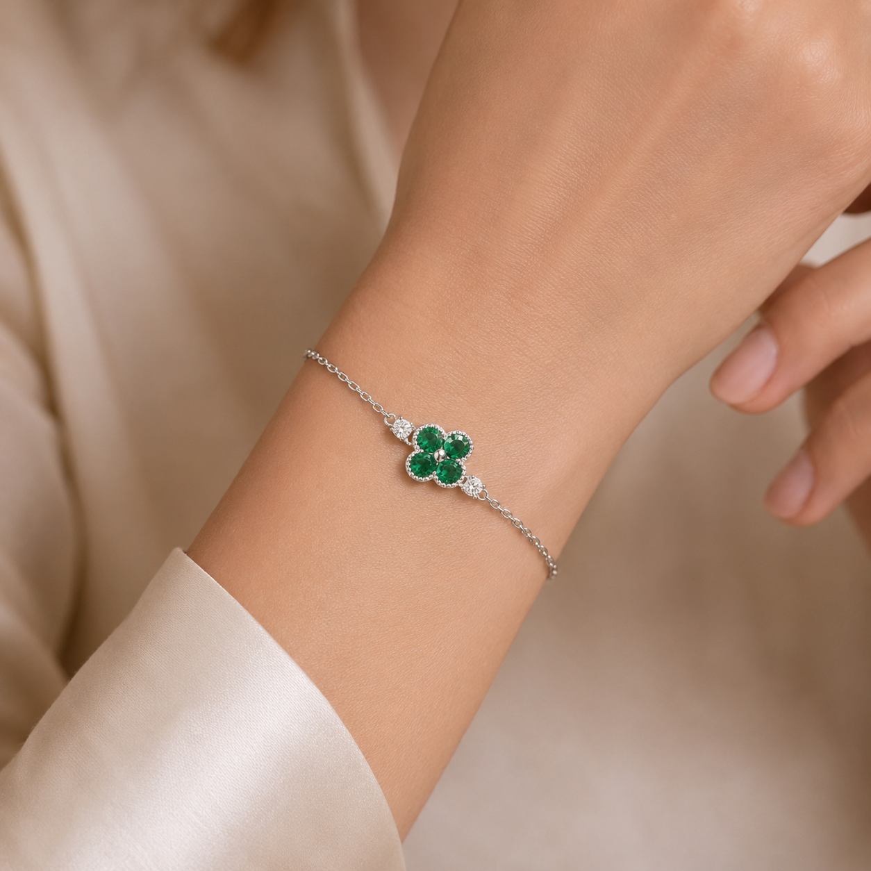 Emerald and Diamond Four-Leaf Clover Chain Bracelet in White Gold