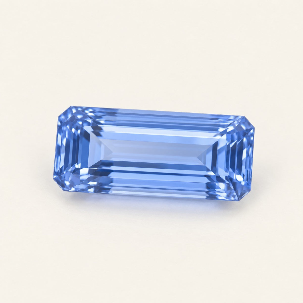 Cornflower blue lab-grown sapphire, baguette cut, 45° view