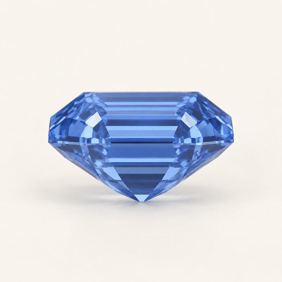 Cornflower blue lab-grown sapphire, emerald cut, side view