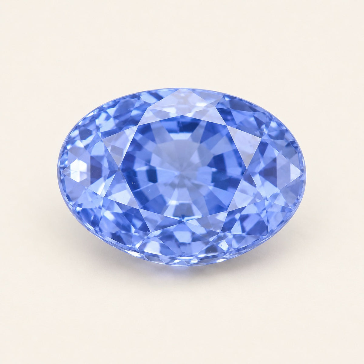 Cornflower blue lab-grown sapphire, oval cut, 45° view
