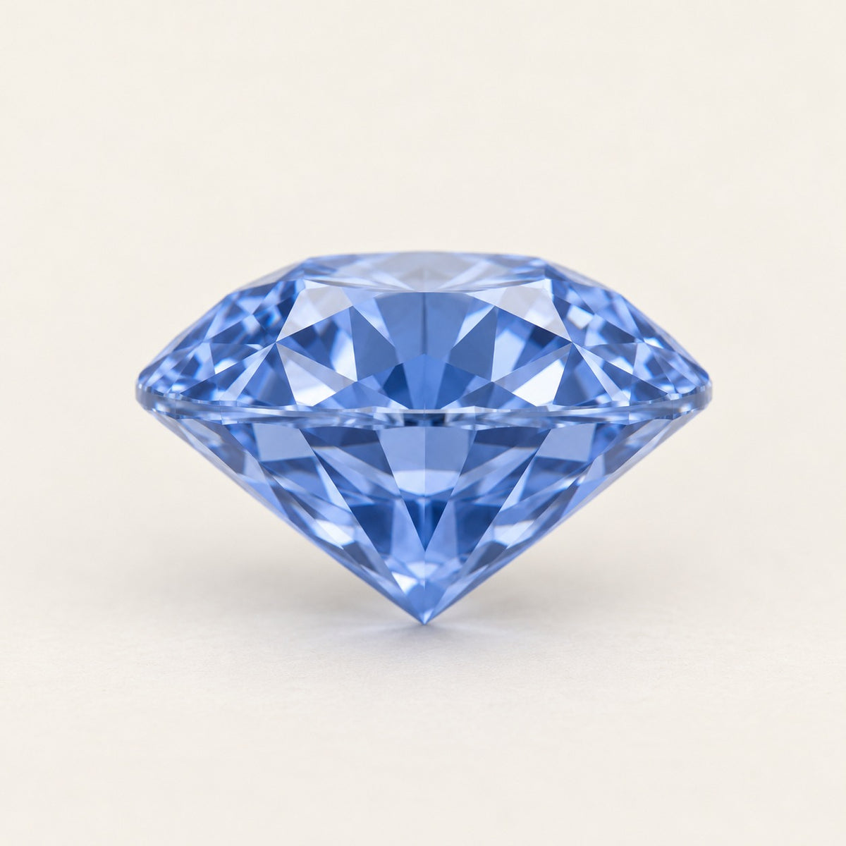Cornflower blue lab-grown sapphire, round cut, side view