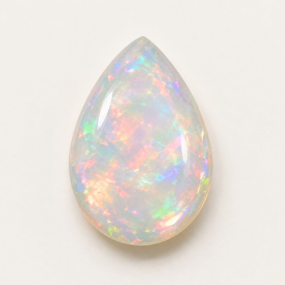 Crystal lab-grown opal, pear cabochon