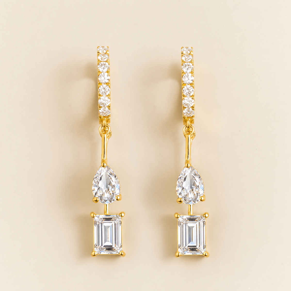 Faire Diamond Drop Earrings on Diamond Pavé Huggie Hoops in Gold | Juvetti