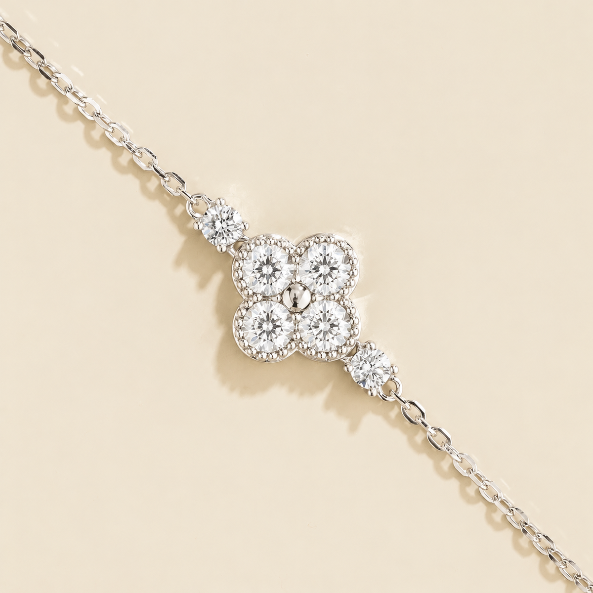 Diamond four-leaf clover chain bracelet in white gold, close-up
