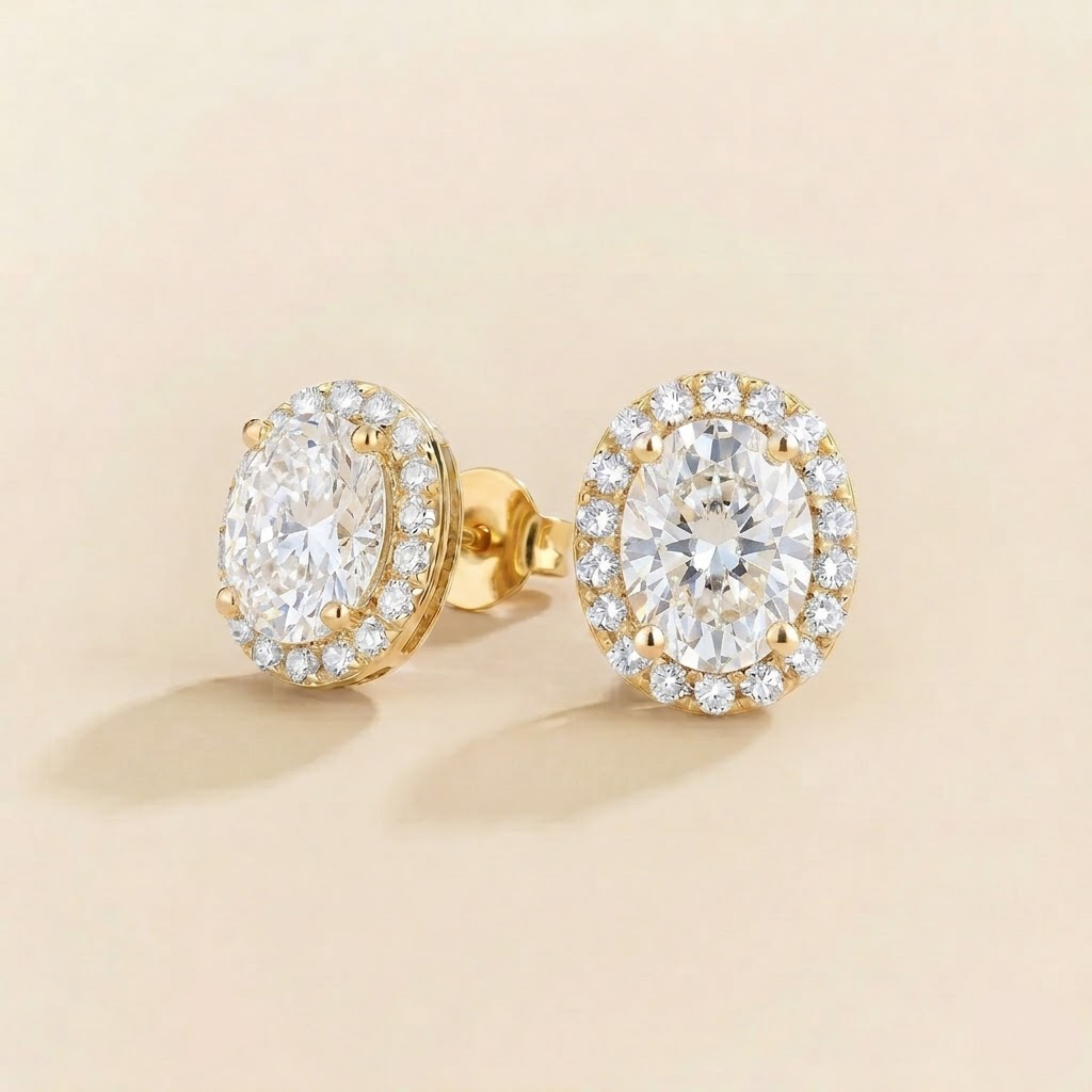Mina oval diamond halo stud earrings in gold, side view