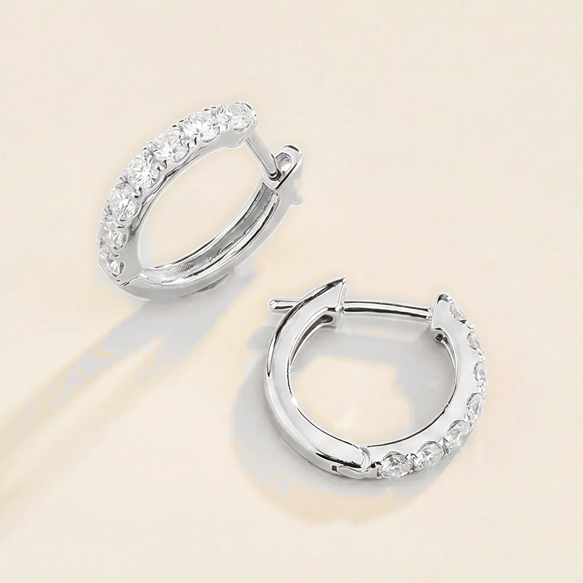 Stacy Diamond Huggie Hoop Earrings in White Gold – angle view