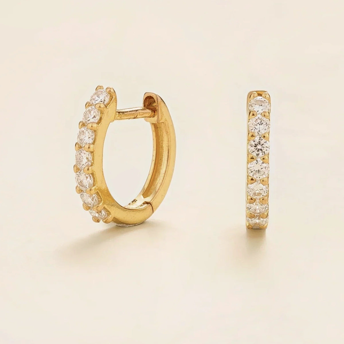 Stacy Mini Diamond Huggie Hoop Earrings in Gold – angle view