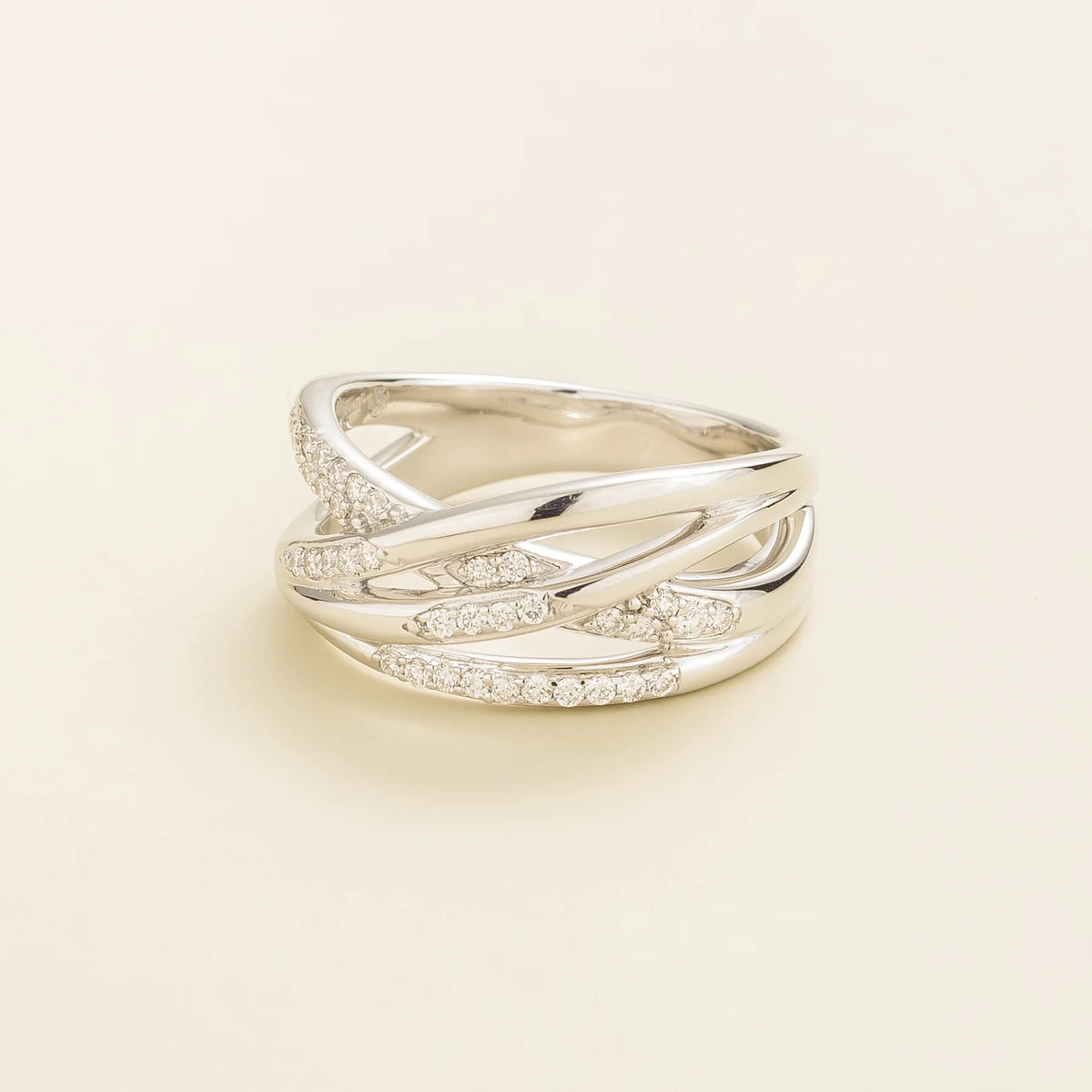 Val multi-row crossover band ring with lab-grown diamonds in white gold – angle view | Juvetti London
