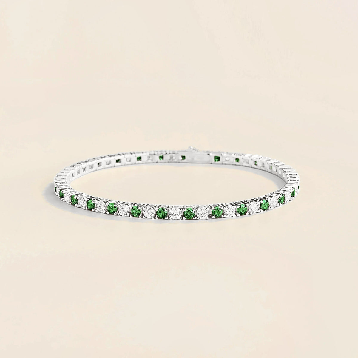 Stacy emerald & diamond round tennis bracelet in white gold