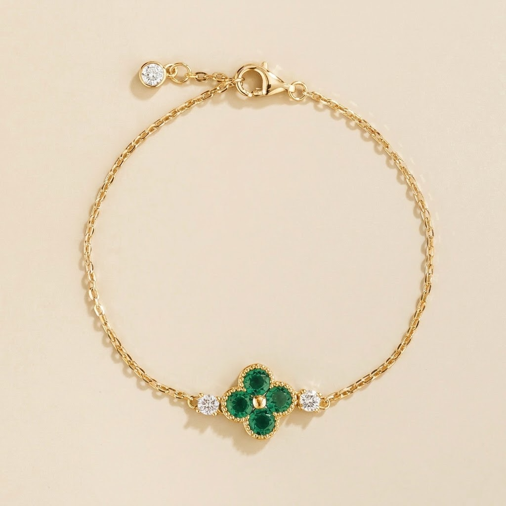 Emerald and diamond clover bracelet in yellow gold