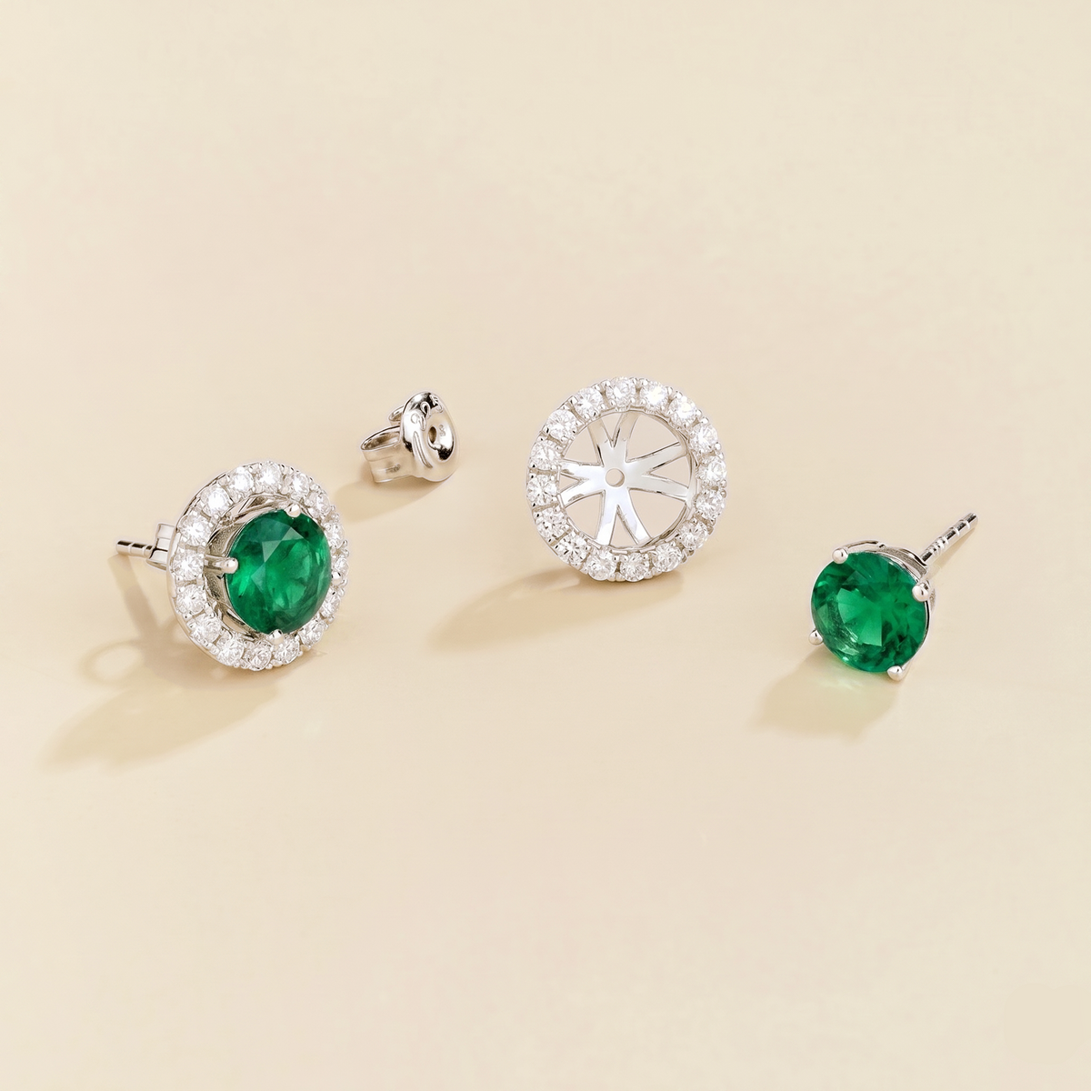 Floret round lab-grown emerald and diamond halo stud earrings in white gold – apart | Juvetti London