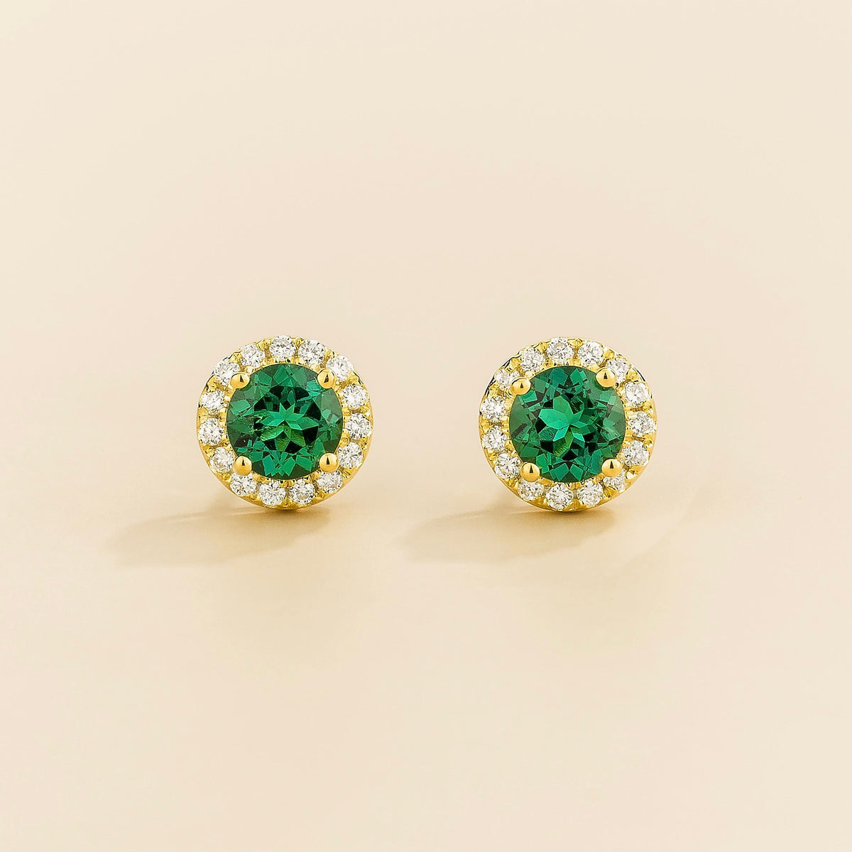 Round lab-grown emerald and diamond halo Mars earrings in gold