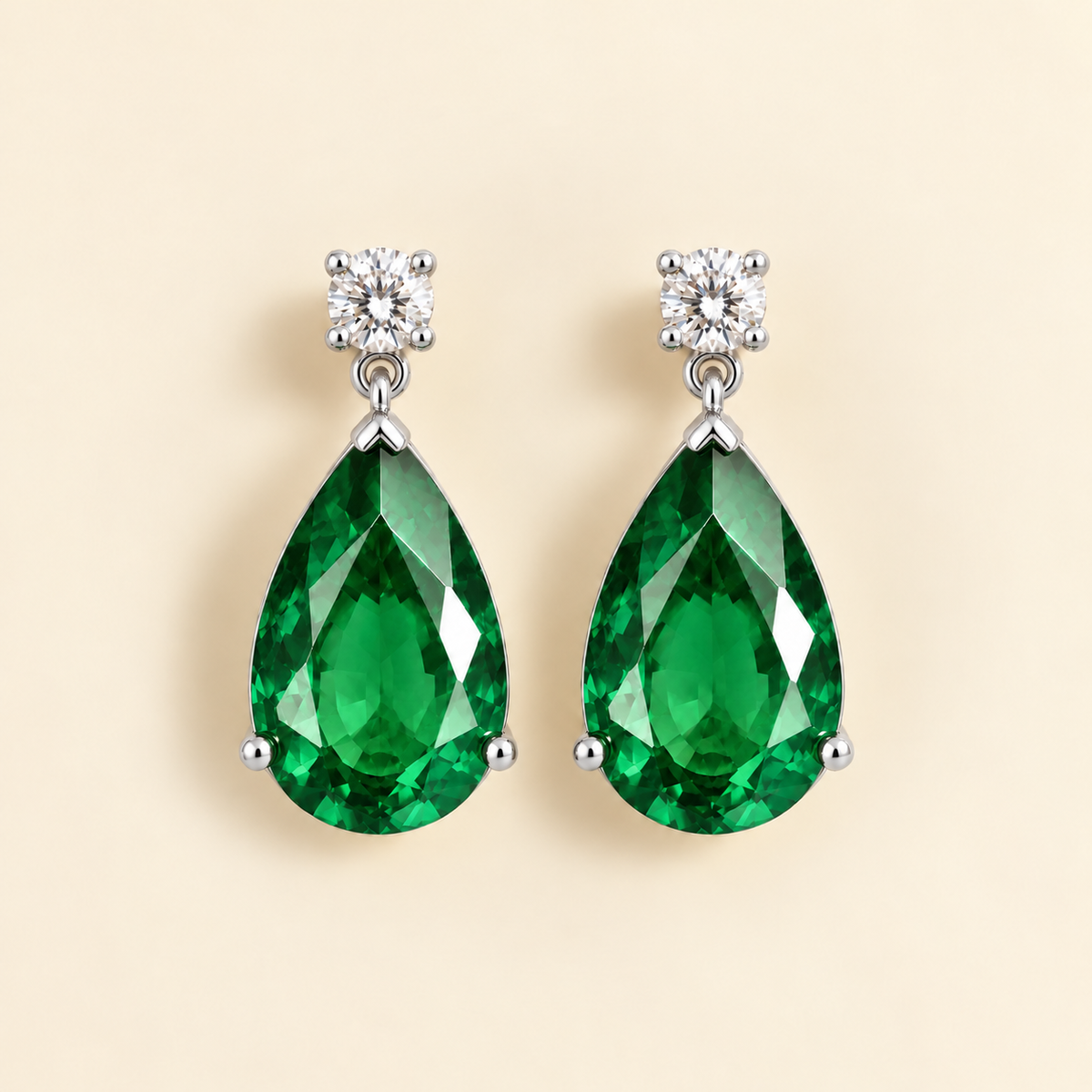 Pisa emerald and diamond large pear drop earrings in white gold