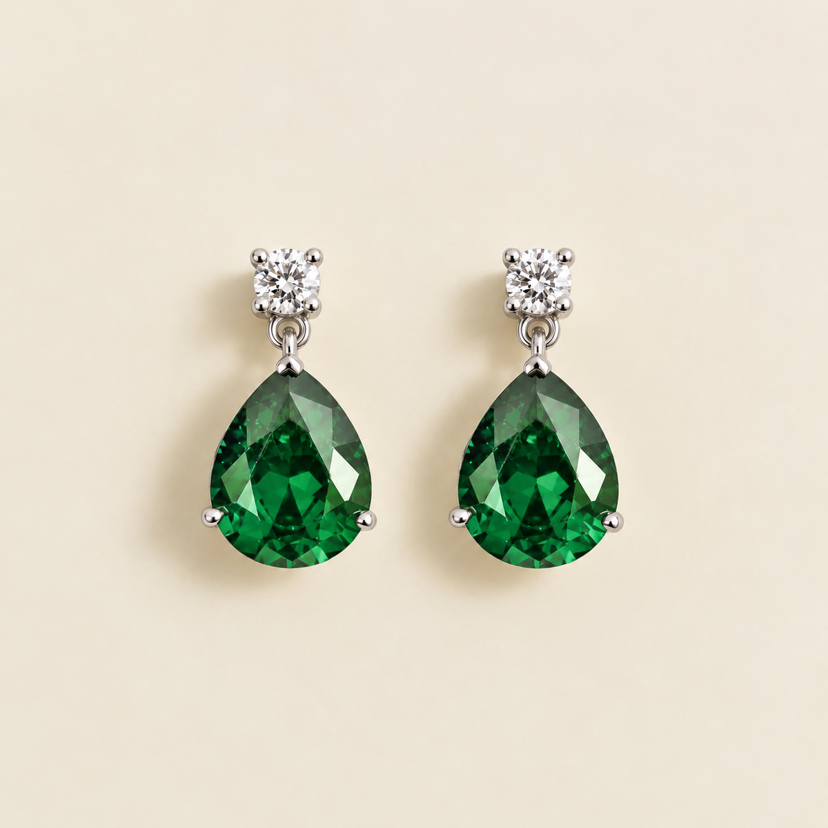 Medium lab-grown emerald and diamond pear drop earrings in white gold – front view | Pisa by Juvetti