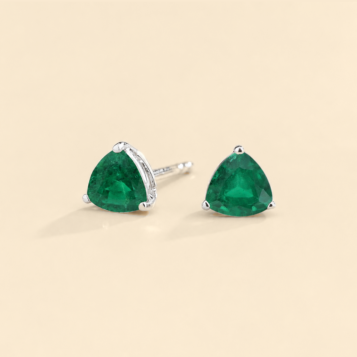 Trillion Emerald Solitaire Stud Earrings in White Gold