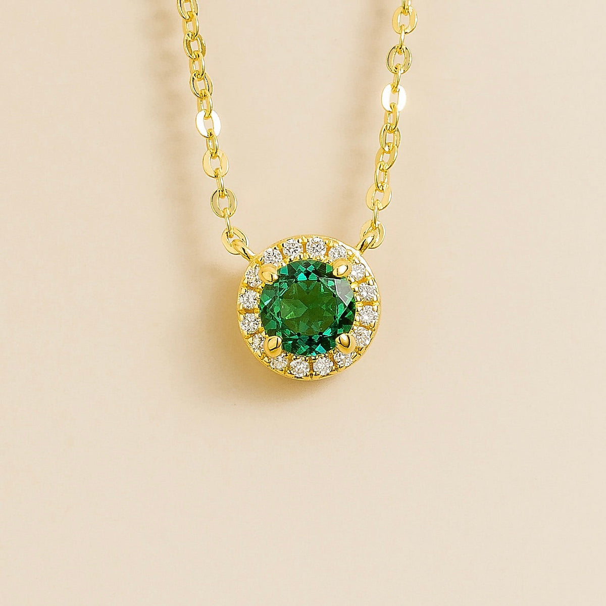 Mars emerald round & diamond halo necklace in gold