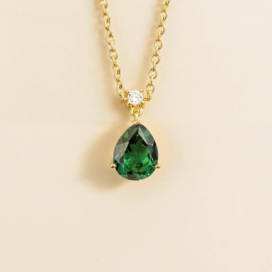 Lab-grown emerald and diamond pear drop pendant necklace in gold, medium – front view | Pisa by Juvetti