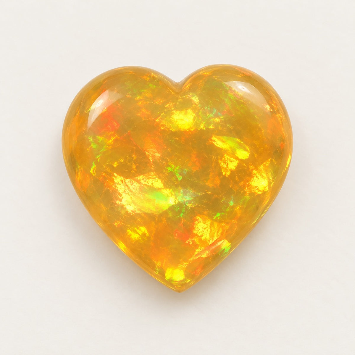 Fire lab-grown opal, heart cabochon