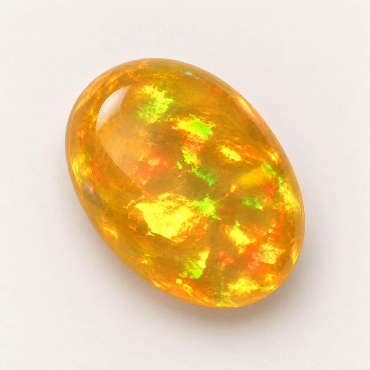 Fire lab-grown opal, oval cabochon, 45° view