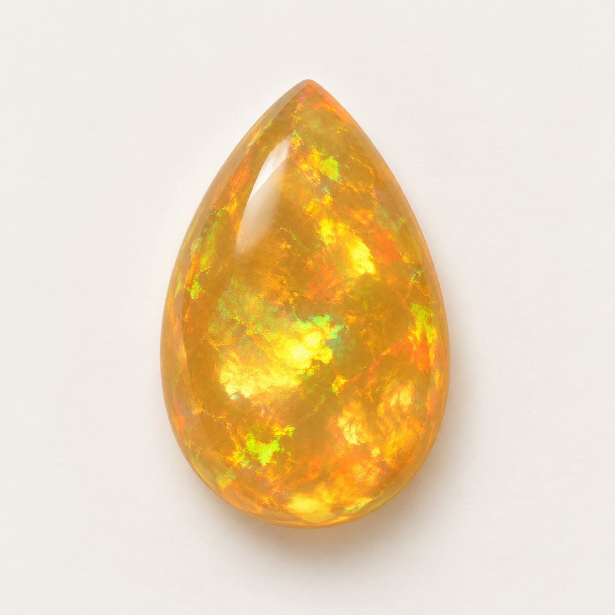 Fire lab-grown opal, pear cabochon