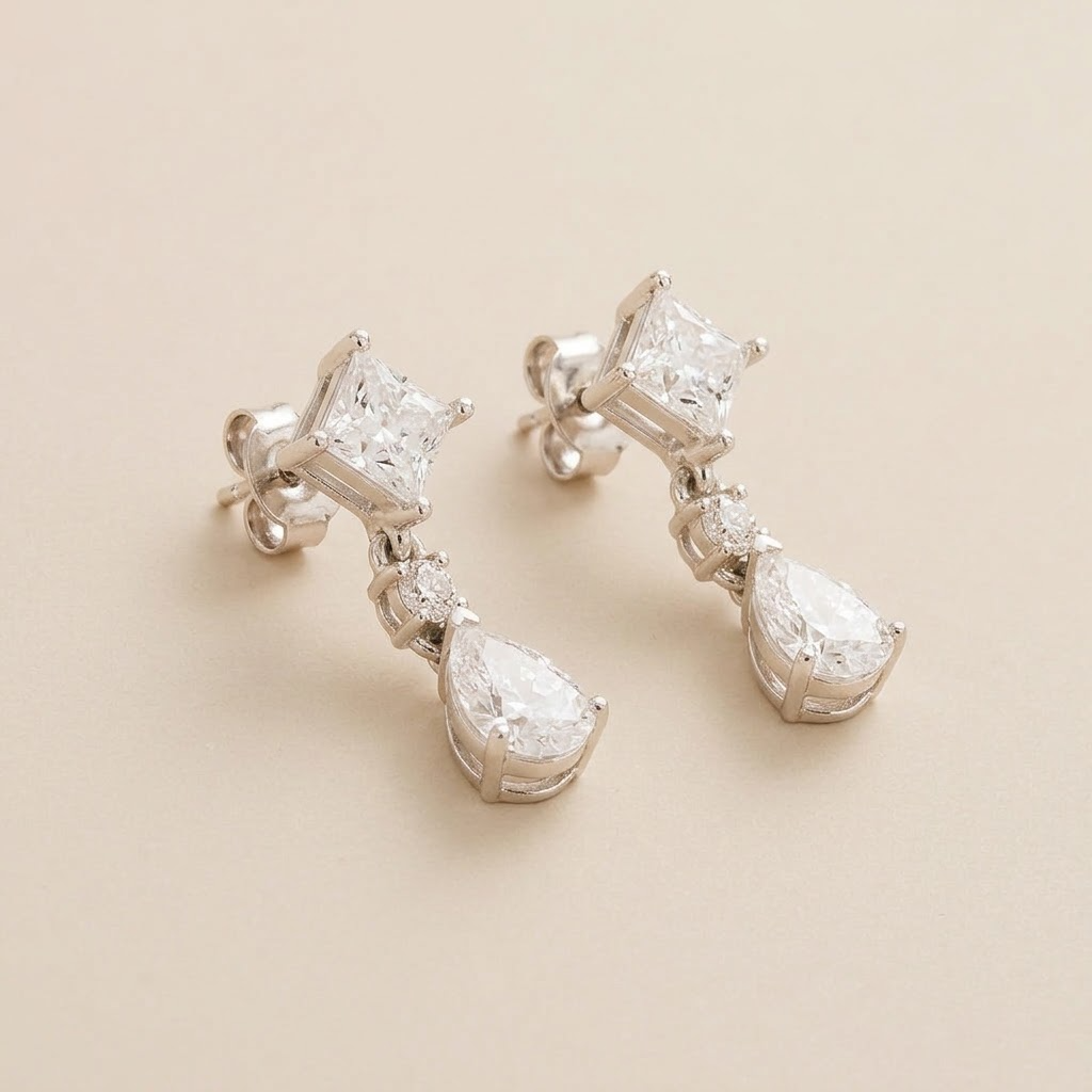 Flamingo Diamond Drop Earrings in White Gold – angle view | Juvetti