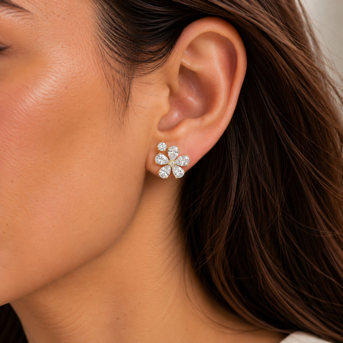 Model wears the Florea Diamond Flower Stud Earrings with Diamond Accent in Gold