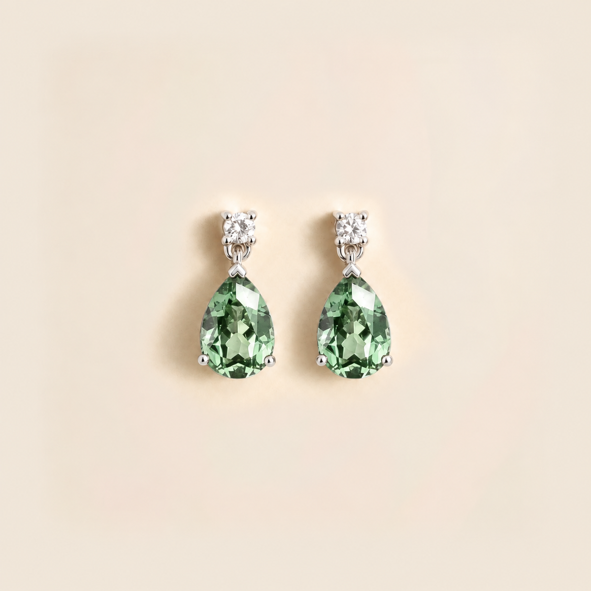 Pisa green sapphire and diamond pear drop earrings in white gold