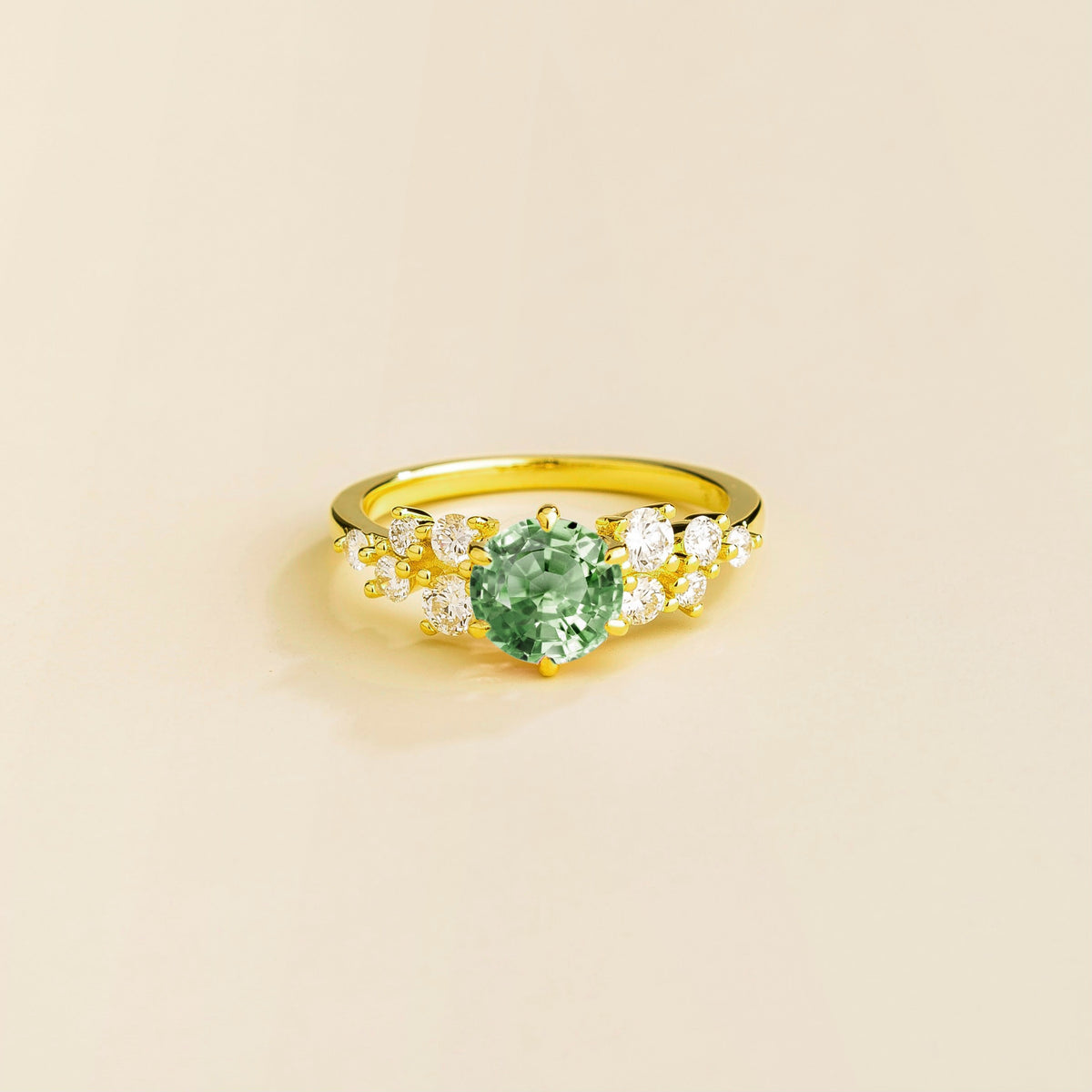 Floret round lab-grown green sapphire and diamond cluster ring in gold – front | Juvetti London