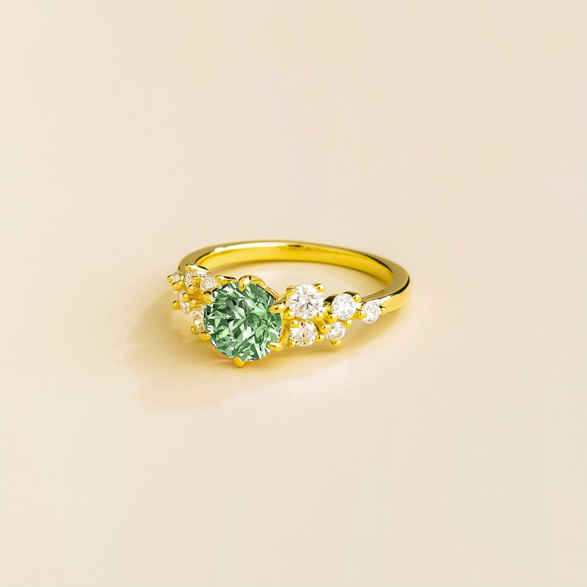 Floret round lab-grown green sapphire and diamond cluster ring in gold – side | Juvetti London