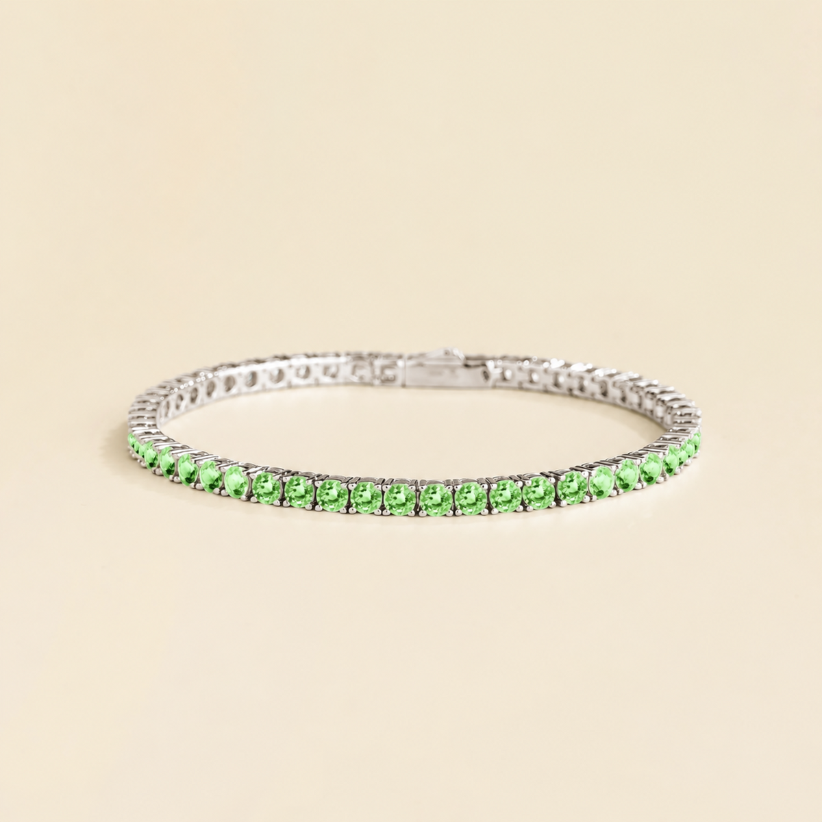 Stacy green sapphire round tennis bracelet in white gold
